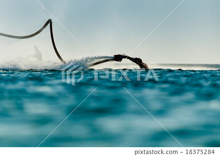 Silhouette of a fly board rider 18375284