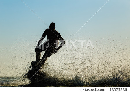 Silhouette of a fly board rider 18375286