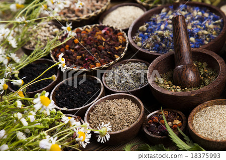 Herbs medicine and vintage wooden background Herbs medicine and vintage wooden background 18375993