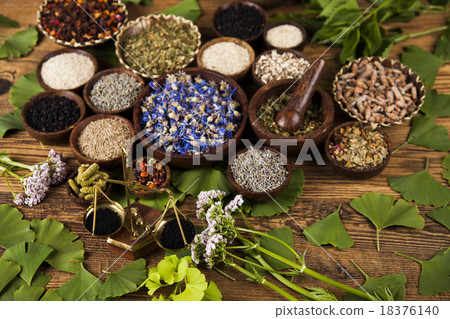 Natural medicine, wooden table background Natural medicine, wooden table background 18376140