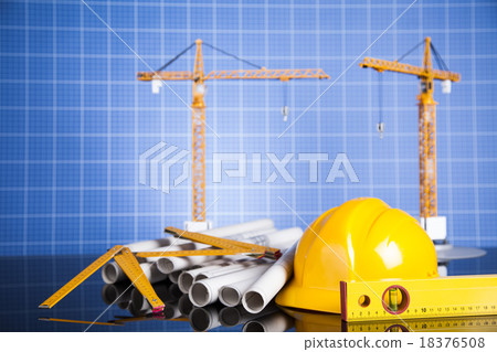 Construction plan with a crane and yellow helmet Construction plan with a crane and yellow helmet 18376508