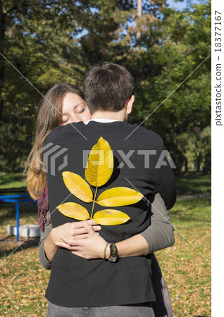 Loving couple hugging in the park 18377167