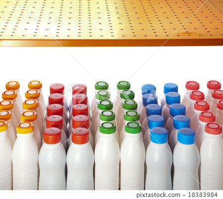 dairy products bottles with bright covers  18383984