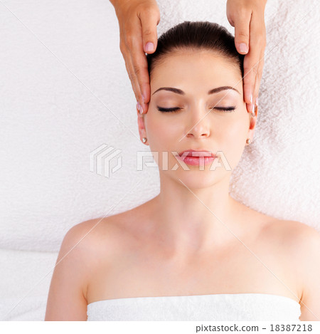 Woman having massage of body in spa salon 18387218