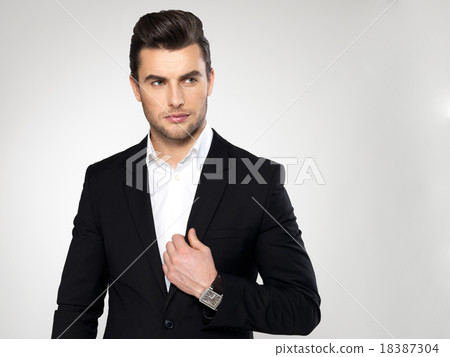 Fashion young businessman in black suit 18387304