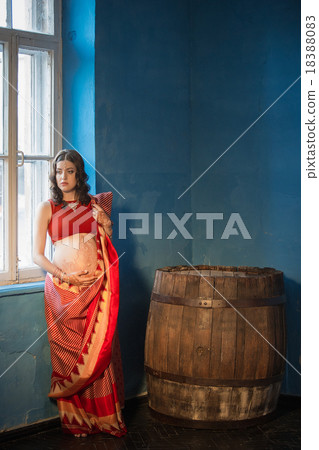 The pregnant woman with henna tattoo 18388083
