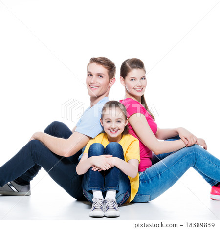 Happy young family with kid sitting. 18389839