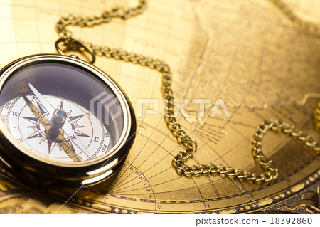 Detail closeup compass, ambient light travel theme 18392860