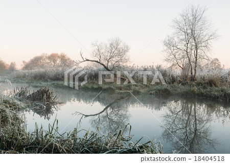 Cold morning by the river 18404518