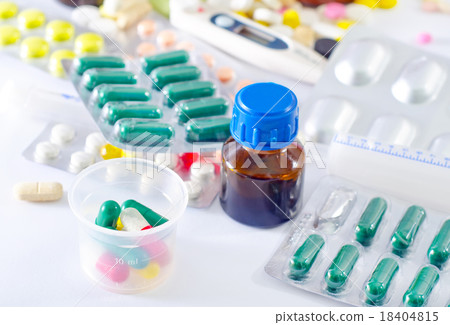 color pills and medical bottle 18404815