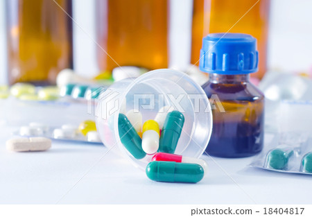 color pills and medical bottle 18404817
