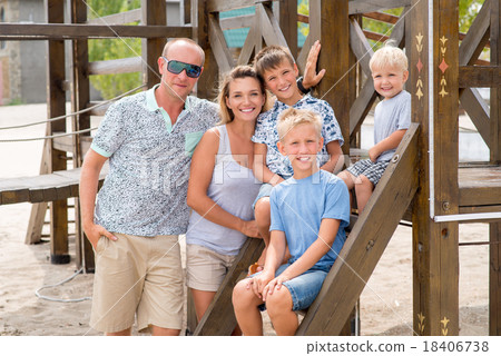 Happy smiling family with three children. 18406738