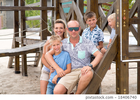 Happy smiling family with three children. 18406740
