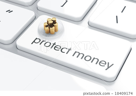 Coins covered by glass bell on computer keyboard 18409174