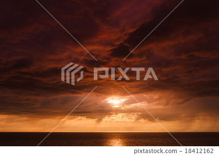 Sunset over the sea 18412162