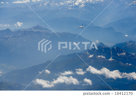 Airplane over the mountain 18412170
