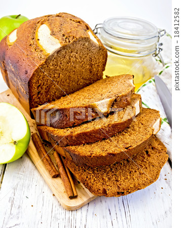 Bread apple with honey on light board Bread apple with honey on light board 18412582