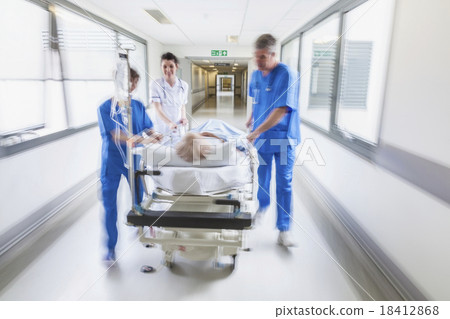 motion blur senior female hospital gurney patient 18412868