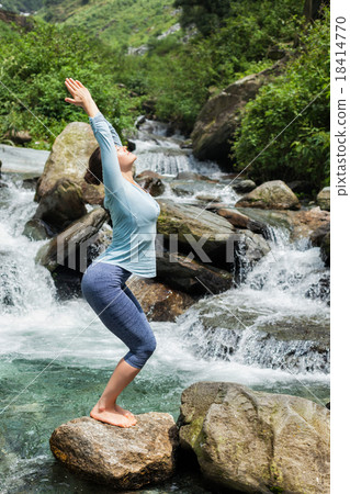 Sorty fit woman doing yoga asana Utkatasana Sorty fit woman doing yoga asana Utkatasana 18414770