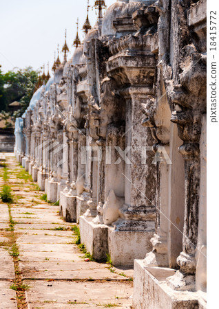 Row of small buildings in Kuthodaw Pagoda Myanmar. 18415772
