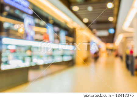 blurred image of shopping mall and people 18417370