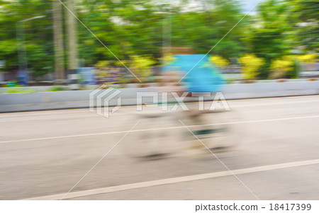 A racing bike rider's slow speed shutter A racing bike rider's slow speed shutter 18417399