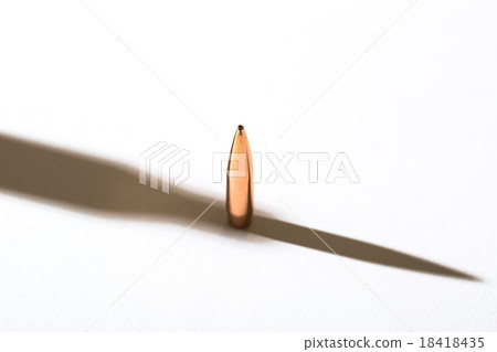 Macro shot of the used cartridge case Macro shot of the used cartridge case 18418435