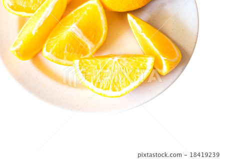 Fresh slics orange fruit isolated on dish 18419239
