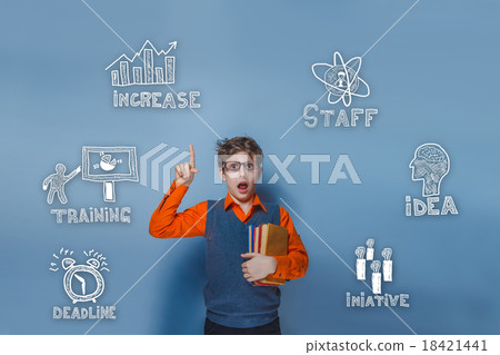 a young teenage boy in a bright orange shirt 18421441