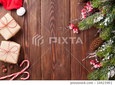 Christmas gift boxes and tree branch 18423901