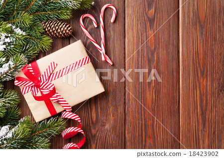 Christmas background with fir tree and gift box 18423902