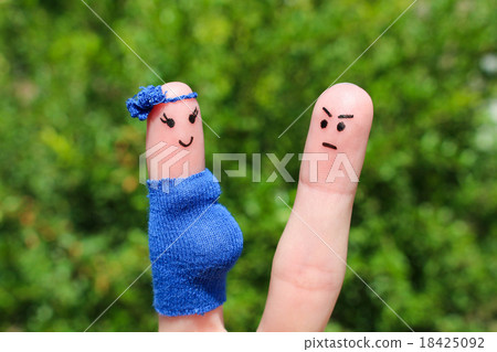 Face painted on fingers. man was upset  18425092