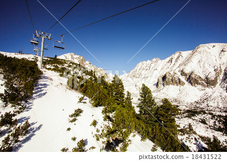 The chairlift in the mountains  The chairlift in the mountains  18431522