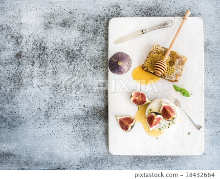 Camembert or brie cheese with fresh figs Camembert or brie cheese with fresh figs 18432664