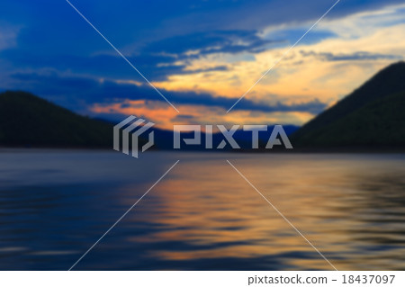 blur scene of lake in evening at Kanchanaburi Thailand blur scene of lake in evening at Kanchanaburi Thailand 18437097