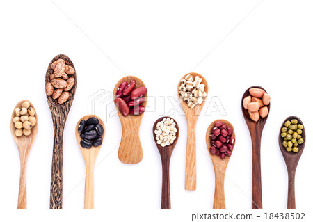 Assortment of beans and lentils in wooden spoon Assortment of beans and lentils in wooden spoon 18438502