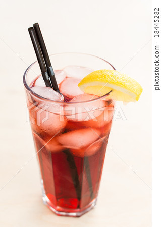Strawberry lemonade with ice in glass on wooden 18445282