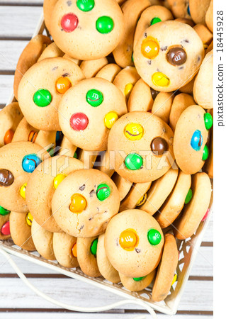 Freshly biscuits in a basket Freshly biscuits in a basket 18445928