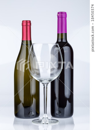 Three wine bottles isolated on white background 18450374