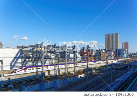 Yamagata bullet train and Tokyo sky tree passing through Nishi Nippori Station 18451366
