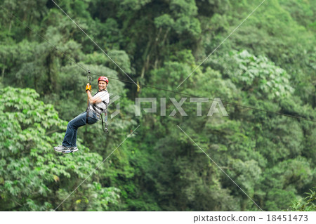 Adult Man On Zip Line Against Green Forest 18451473