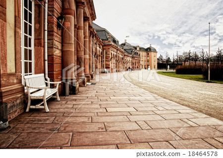 Red sandstone palace walkway with row of columns. Red sandstone palace walkway with row of columns. 18464578