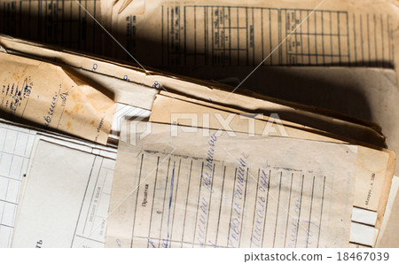 Pile of the old paper documents in the archive 18467039