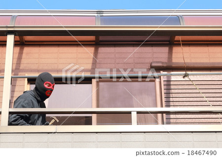 One man (Residential invasion thief crime criminal illegal culprit villain stolen cigarette hat disguised suspect case criminal) 18467490