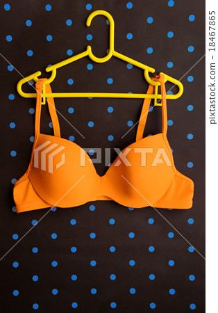 bra on coat hanger on blue. (Pop art style) bra on coat hanger on blue. (Pop art style) 18467865