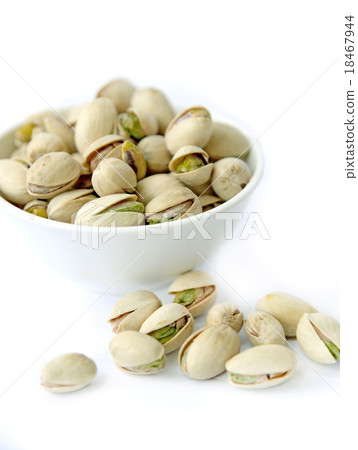 Many pistachio on white background 18467944
