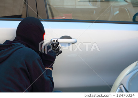 One man (car crime thief crime criminal illegal culprit villain theft eyed out hat disguised suspect case criminal) 18470324