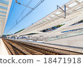 Modern railway station with transparent ceiling and blue sky 18471918