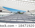 Modern railway station with transparent ceiling and blue sky 18471920
