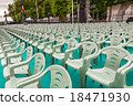 Rows of green plastic chairs outdoor celebration event 18471930